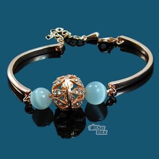 دستبند زنانه طلایی طرح مروارید و تاج مدل DT-65